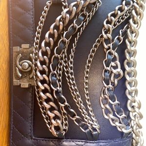 Sturdy Unique faux Channel crossbody bag. Unisex